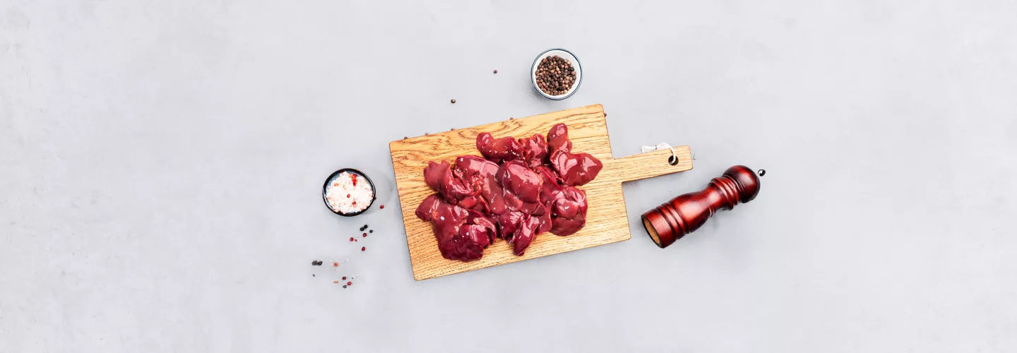 Raw liver on cutting board