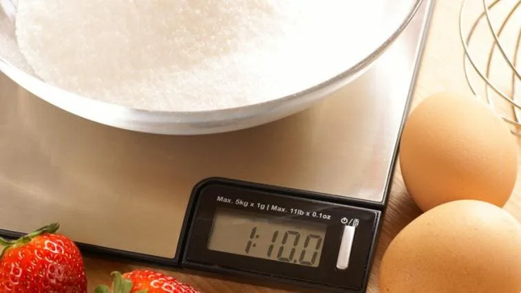 Bowl of sugar on scale