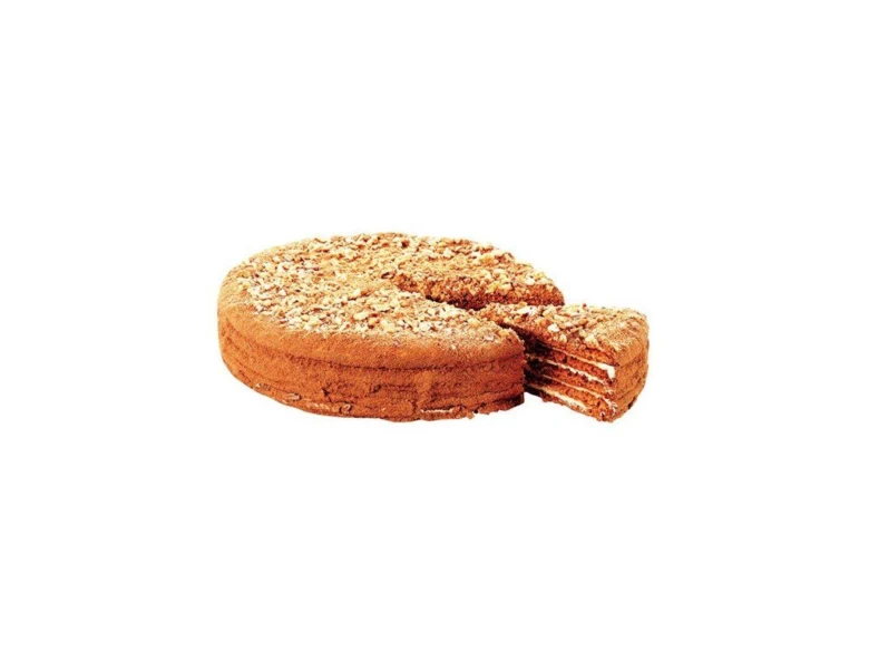 Medovník s odseknutým kouskem ukazuje vrstvy.