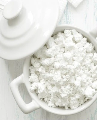 Fresh cottage cheese in bowl