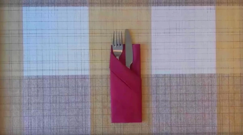 Folded napkin with cutlery