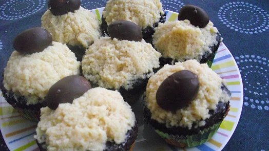 Chocolate muffins with coconut topping and chocolate candies