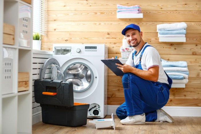 Technician with washing machine