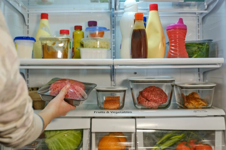 Refrigerator with food containers