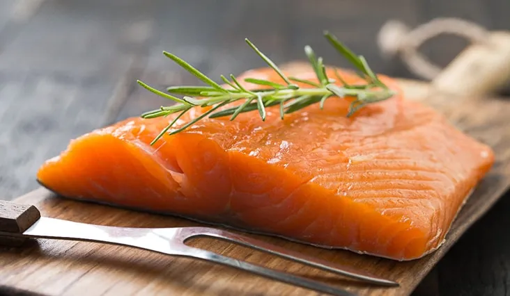 Raw salmon fillet with rosemary