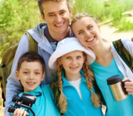 Happy family hiking outdoors